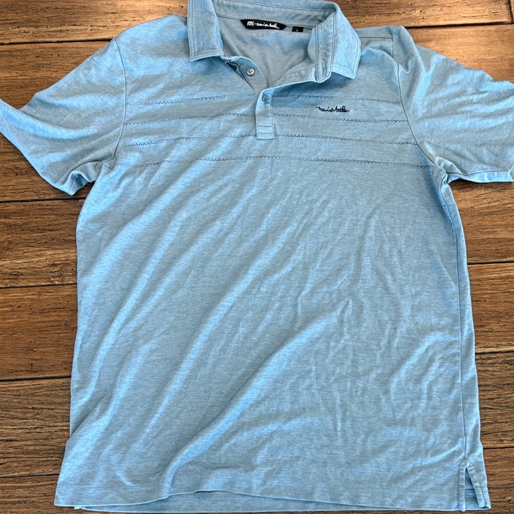 Travis Mathew Light Blue Polo with Subtle Stitch Detailing